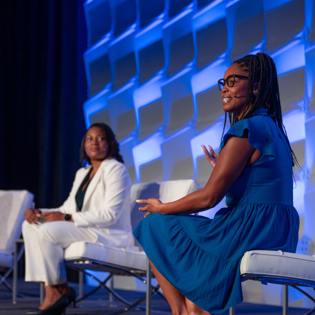 Two speakers on stage at Code for America Summit